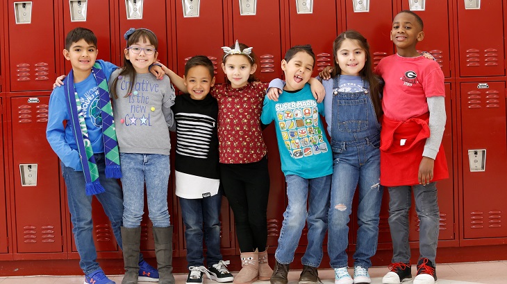 Kids at School in front of lockers