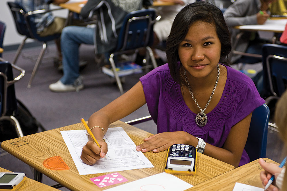 Picture of girl sitting at school desk