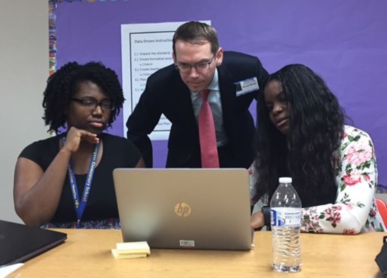 commissioner_with_two_students.jpg